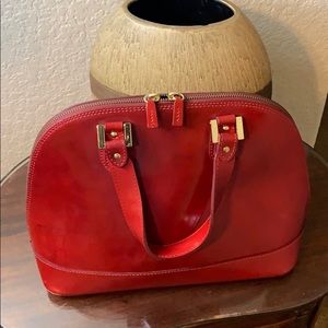 Alberta Dicanio red hand purse